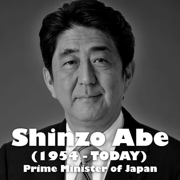 This politician enjoys a good drink of sake. Who is it? Erase the photo with your finger front
