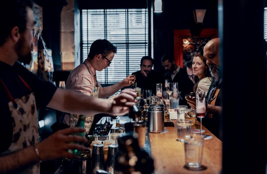 15 Best Places to Sit and Watch a Great Bartender Work - little red door paris