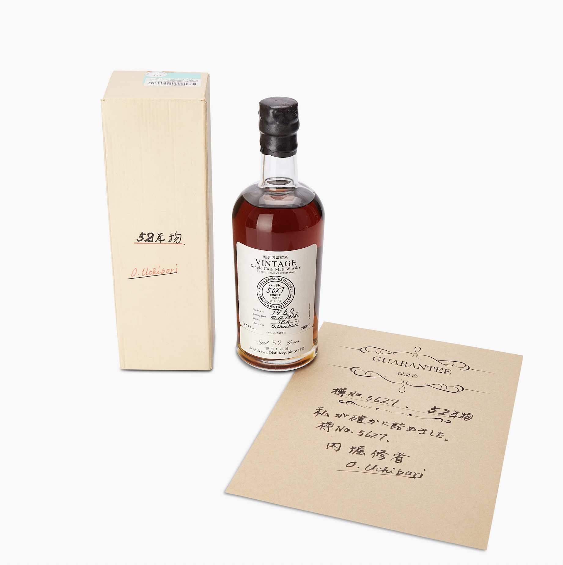 A bottle of Karuizawa 1960 Cask #5627 Aged 52 Years Japanese whiskey, with its original box and handwritten certificate of authenticity.